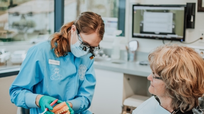 Our hygienist Bethany during a toothbrushing demo Photo