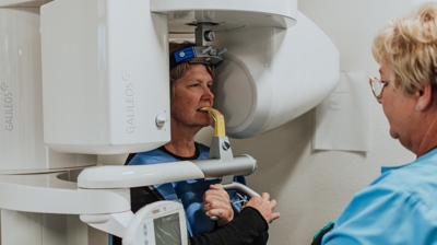 Our hygienist Leslie taking a CBCT scan Photo