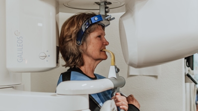 Our hygienist Leslie taking a CBCT scan Photo